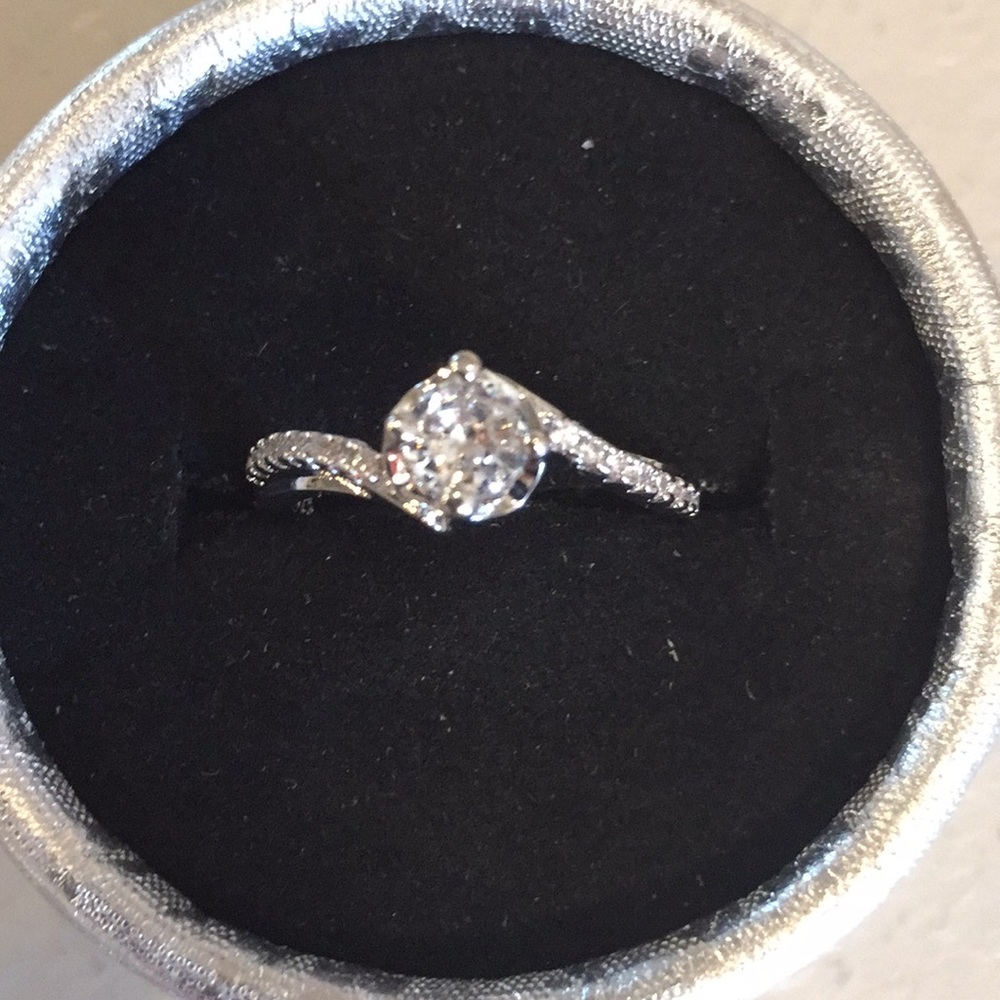 Size 7 White sapphire stamped 925.Beautiful RING